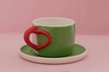 handmade ceramic mug with interesting design
