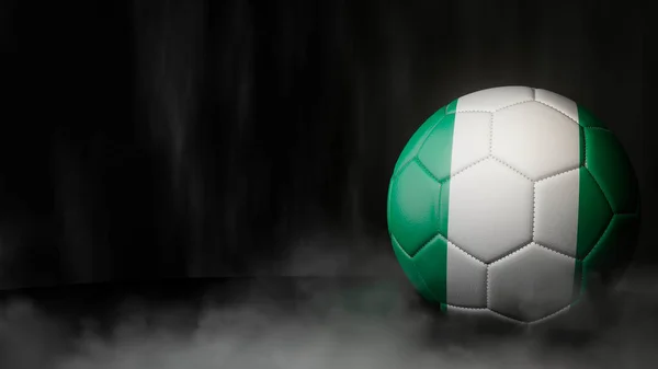Soccer ball in flag colors on a dark abstract background. Nigeria. 3D image.
