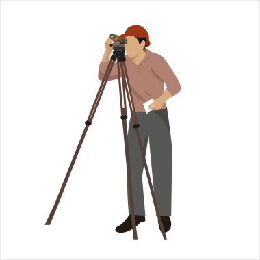 Müteahhit kata bakar. İnceleme aleti olan bir adam. Bir arazi mühendisinin işi. Arazi mühendisi ölçü alıyor. İnşaat alanına bakan teodolit mühendisi.