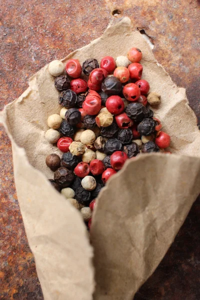 Peppercorns colourful on vintage background — Stock Photo, Image