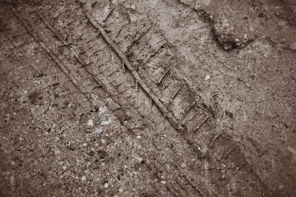 Wheel tracks on the soil — Stock Photo, Image