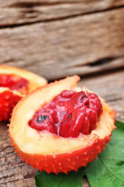 Tropical Gac Fruit Wood Background — Stock Photo, Image