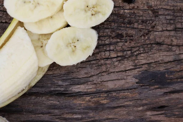 Tropische Vruchtenschijfjes Bananen Bruine Ondergrond Textuur — Stockfoto