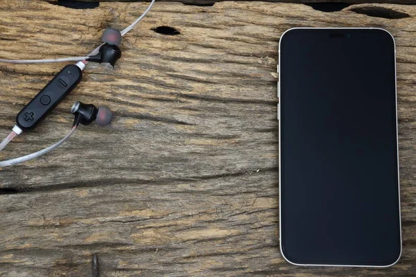 Smart Phone Earphone Music Brown Wood Table — Stock Photo, Image