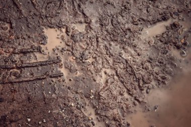 Toprak yol arkaplanı veya desen üzerindeki tekerlek izleri