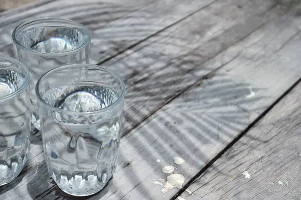 Water Drink Glass Leaves Shadow Wood Table Background — Stock Photo, Image