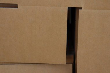 Kahverengi karton kutu paketleme arkaplanını veya deseni kapat