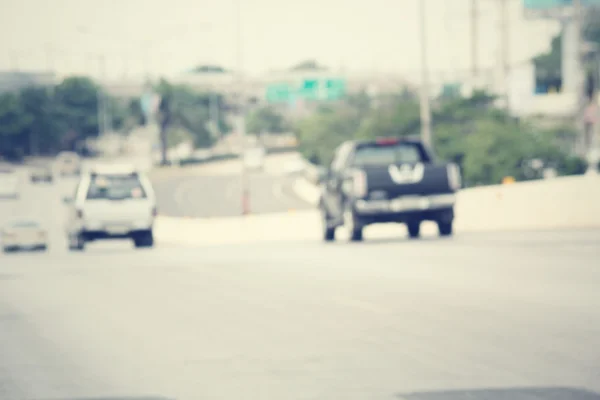 Blurred of car in city — Stock Photo, Image