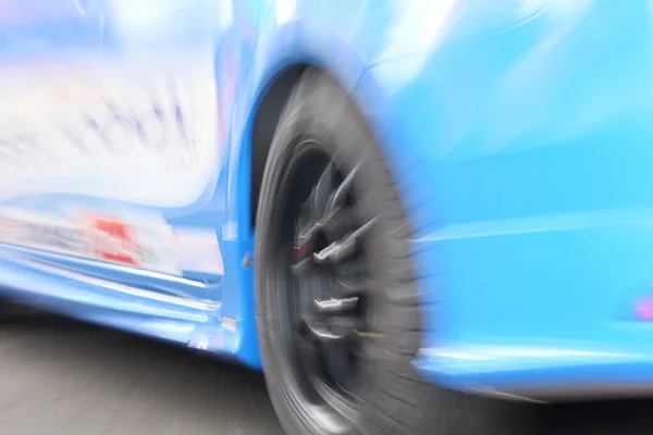 Blurred of racing car — Stock Photo, Image