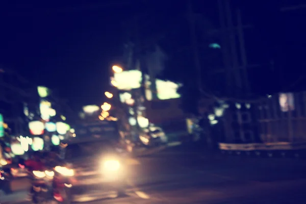 blurred of car in city at night