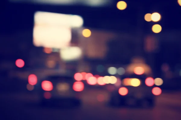 Blurred of car in city at night — Stock Photo, Image