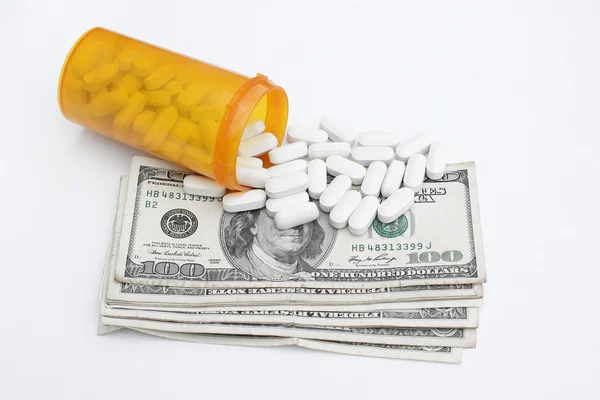 Tabletták és a dollár — стокове фото