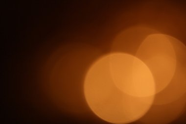 Siyah arkaplanda altın bokeh