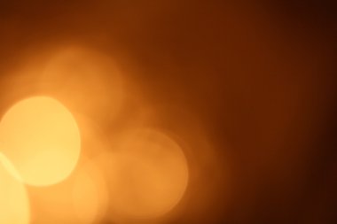 Siyah arkaplanda altın bokeh