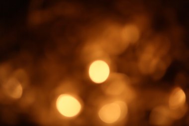 Siyah arkaplanda altın bokeh