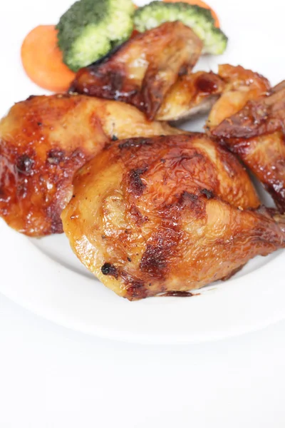 Roasted chicken legs and wings — Stock Photo, Image