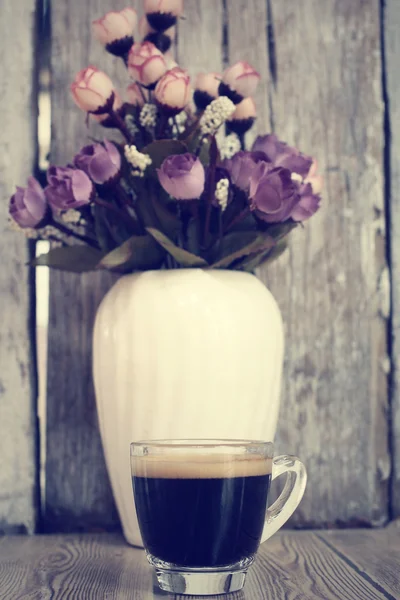 Kaffeetasse mit Vintage-Hintergrund — Stockfoto