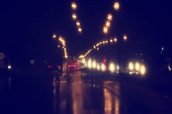 Blurred of car in city at night — Stock Photo, Image