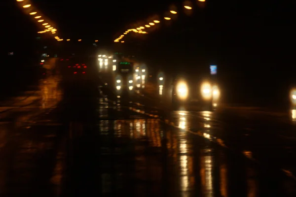 Difuminado de coche en la ciudad por la noche —  Fotos de Stock