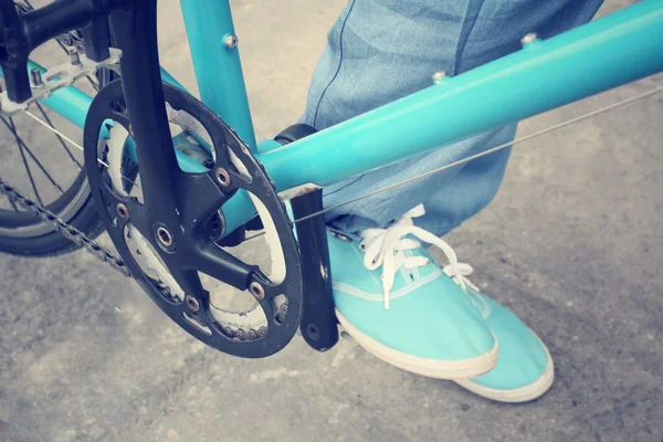 Riding bicycle with legs — Stock Photo, Image