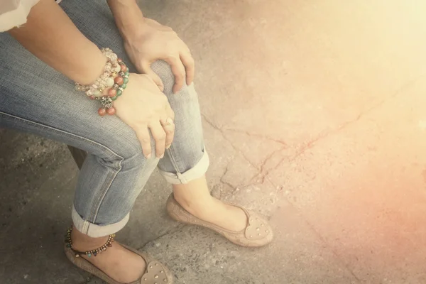 Woman sitting on chair — Stock Photo, Image