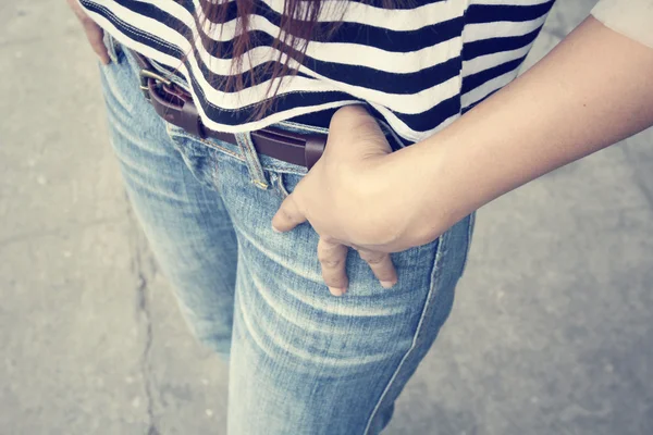 Jeans pocket with hand — Stock Photo, Image