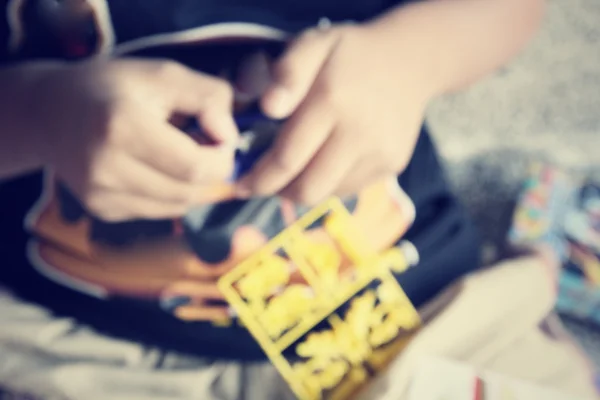 Blurred of boy with toys — Stock Photo, Image