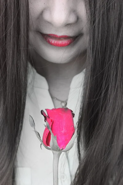 Woman with red rose — Stock Photo, Image