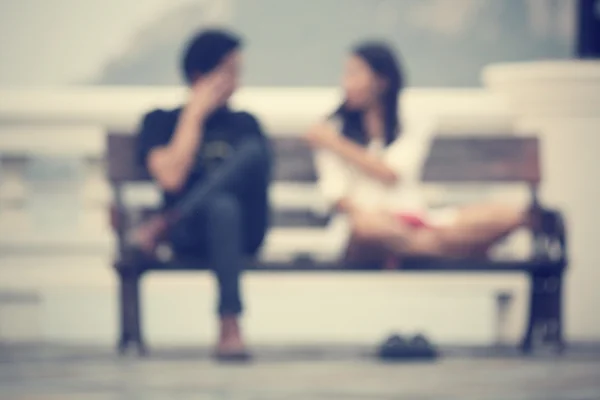 Blurred of love couple on bench — Stock Photo, Image