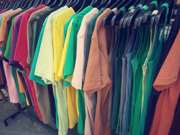 T-shirts on hangers — Stock Photo, Image