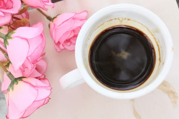 Stain of coffee with roses Royalty Free Stock Images