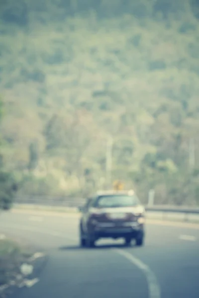 Embaçado de carro na estrada — Fotografia de Stock