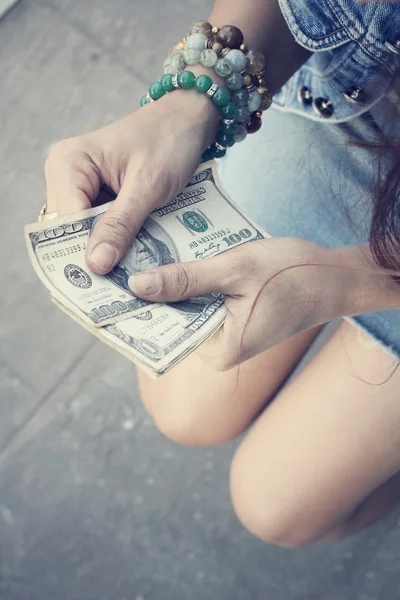 Woman with dollars
