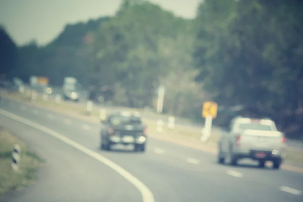 Blurred of car on road — Stock Photo, Image