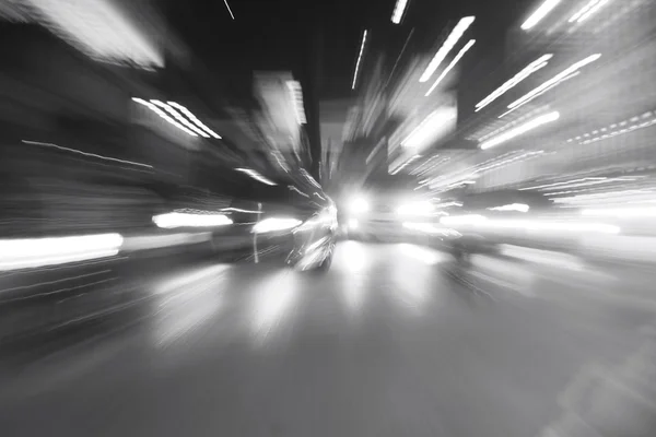 Blurred of car in city at night