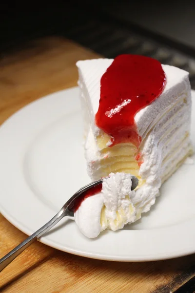 Crepe cake with strawberry sauce — Stock Photo, Image