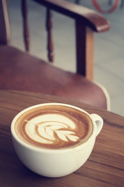 Vintage latte art coffee — Stock Photo, Image