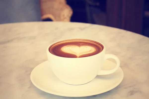 Vintage latte art coffee — Stock Photo, Image