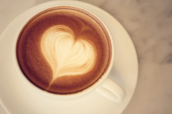 Vintage latte art koffie — Stockfoto