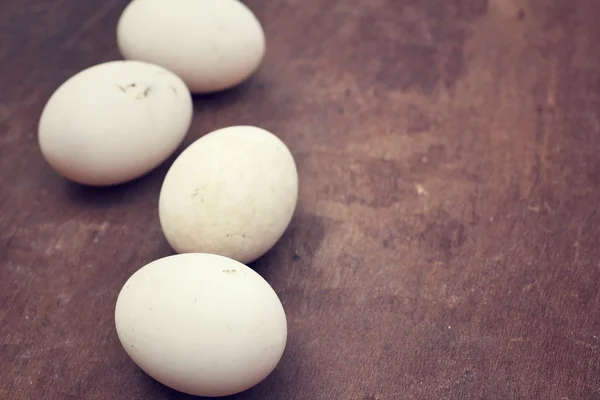 Eggs on the wood — Stock Photo, Image