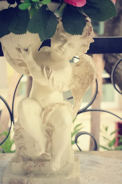Cupid skulptur — Stockfoto