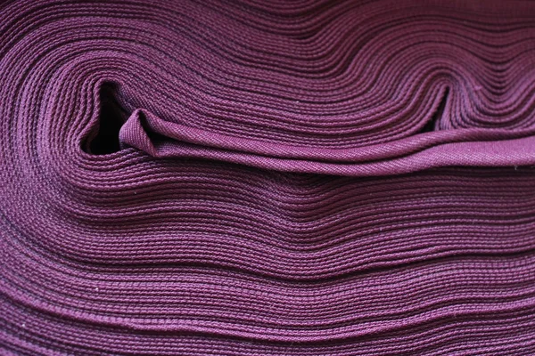 Fioletowy tkanina tło — Zdjęcie stockowe