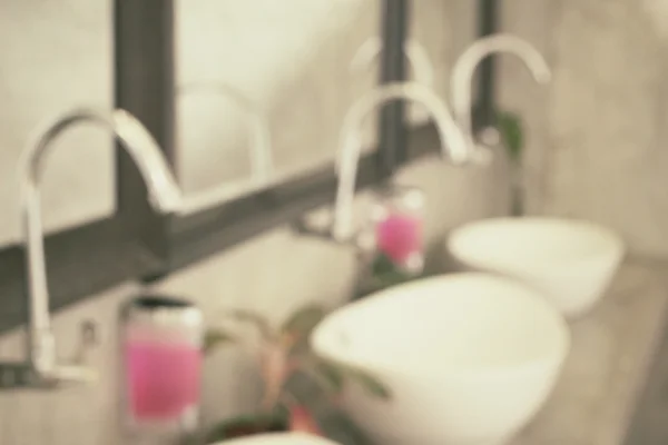 Blurred of public empty restroom with washstands mirror — Stock Photo, Image