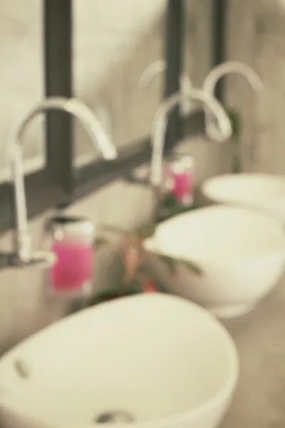 Blurred of public empty restroom with washstands mirror — Stock Photo, Image