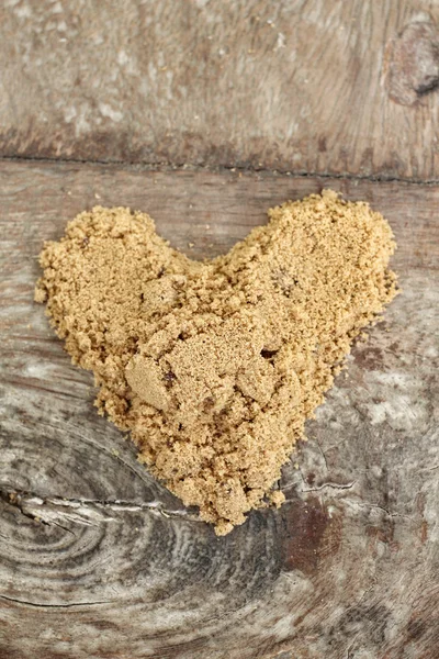 Hjärtat av brunt socker — Stockfoto