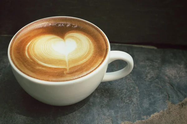 Vintage latte art koffie — Stockfoto