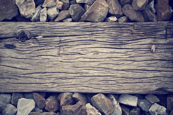Sten med wood bakgrund — Stockfoto