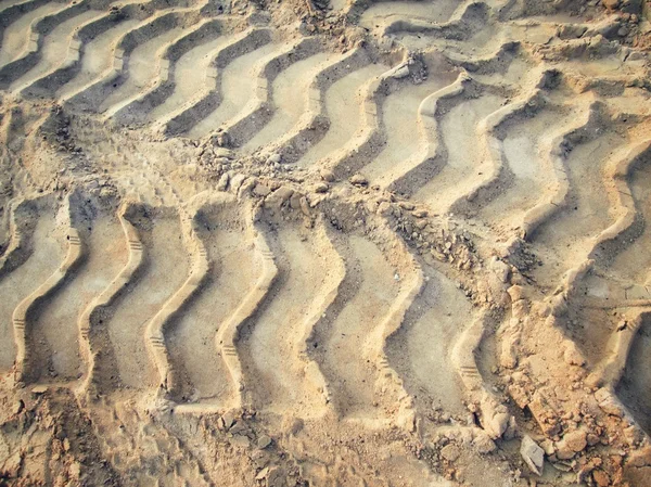 Tracce di ruote sul terreno. — Foto Stock