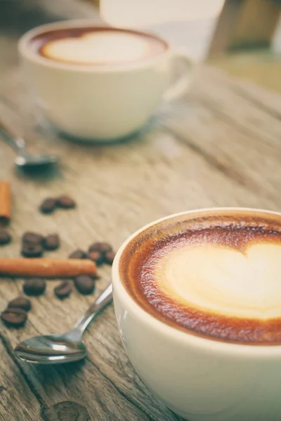 Two cups of latte art coffee — Stock Photo, Image