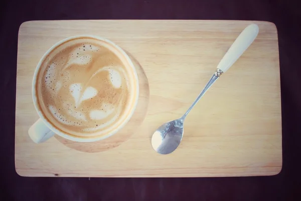Vintage latte kunstkaffe – stockfoto